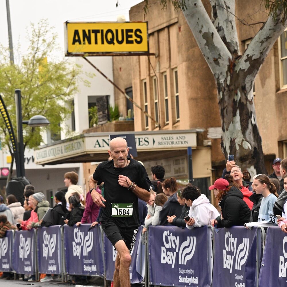 Simon running the City-Bay in Adelaide, race number 1584.